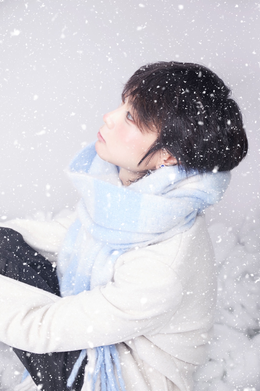 Snow editorial with a blue scarf